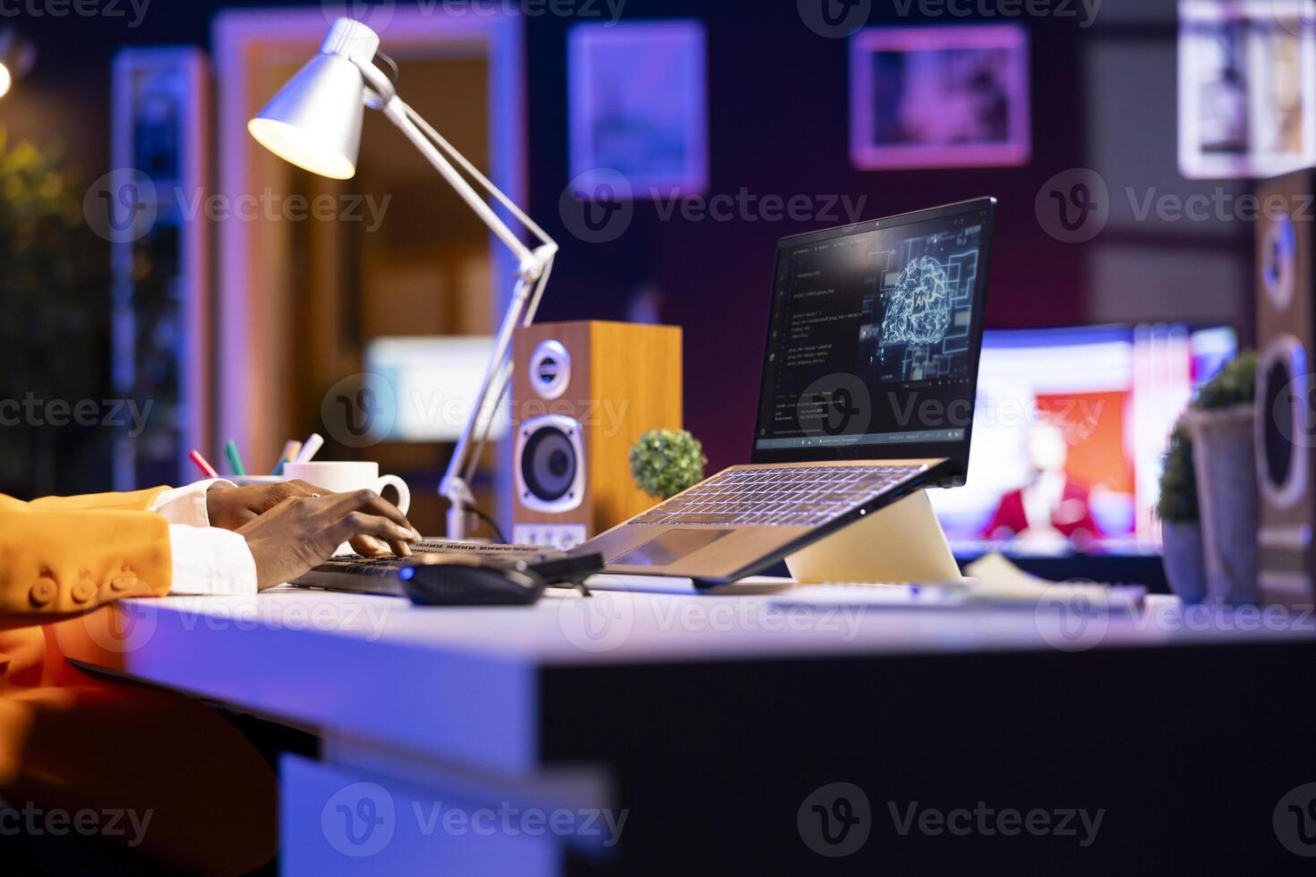 Admin using notebook in home office for artificial intelligence computing simulating human brain through self learning algorithms. Employee working with AI deep neural networks on laptop photo