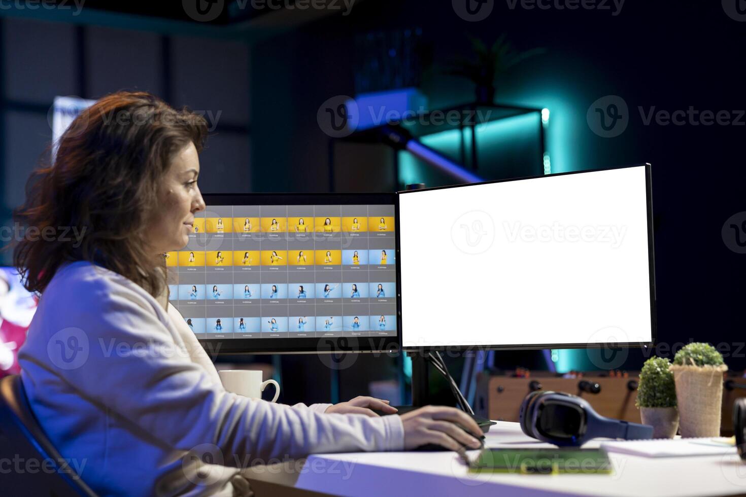 Freelancer working on isolated screen PC on digital portfolio showcasing photoshoot edited images. Photo editor selecting best photographs using retouching software interface on mockup monitor