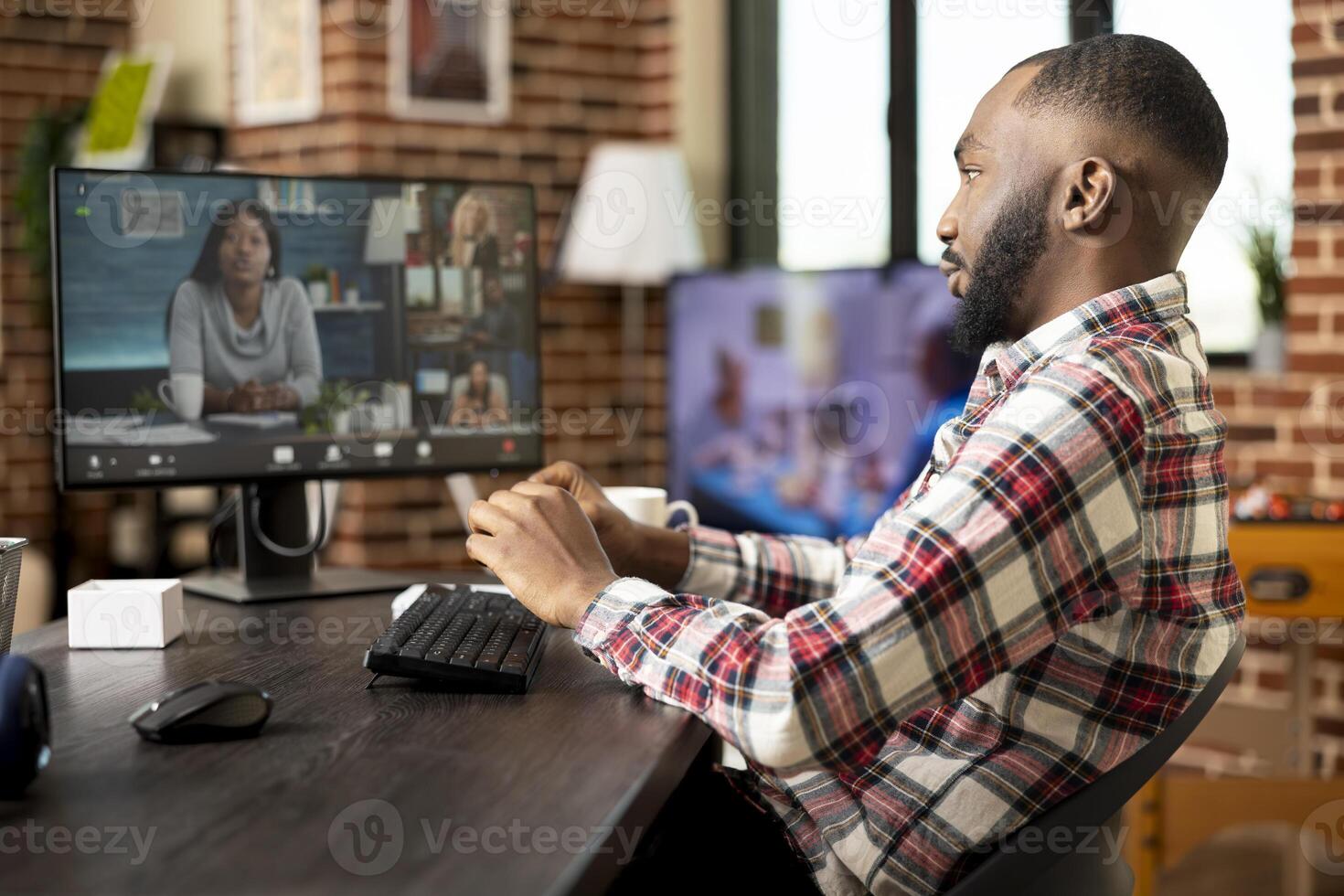 Businessman remotely presenting innovative startup plan in call with diverse group of investors and partners. Entrepreneur in teleconference meeting, networking with multiethnic professionals. photo