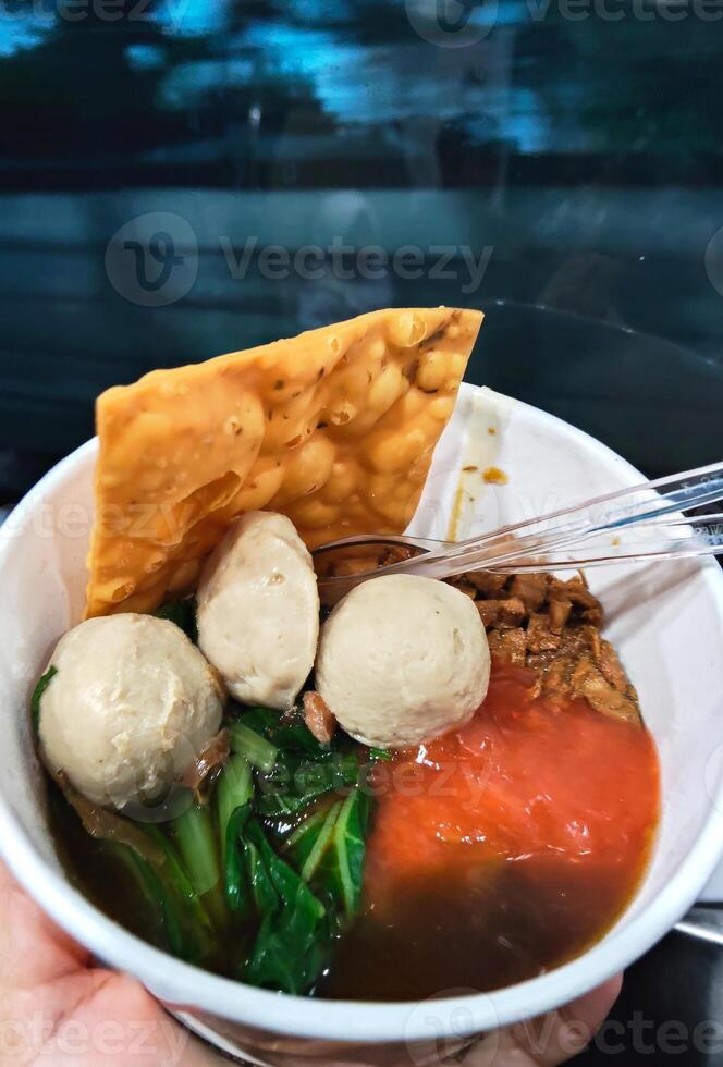 Indonesian Bakso Meatball Soup with Noodles photo