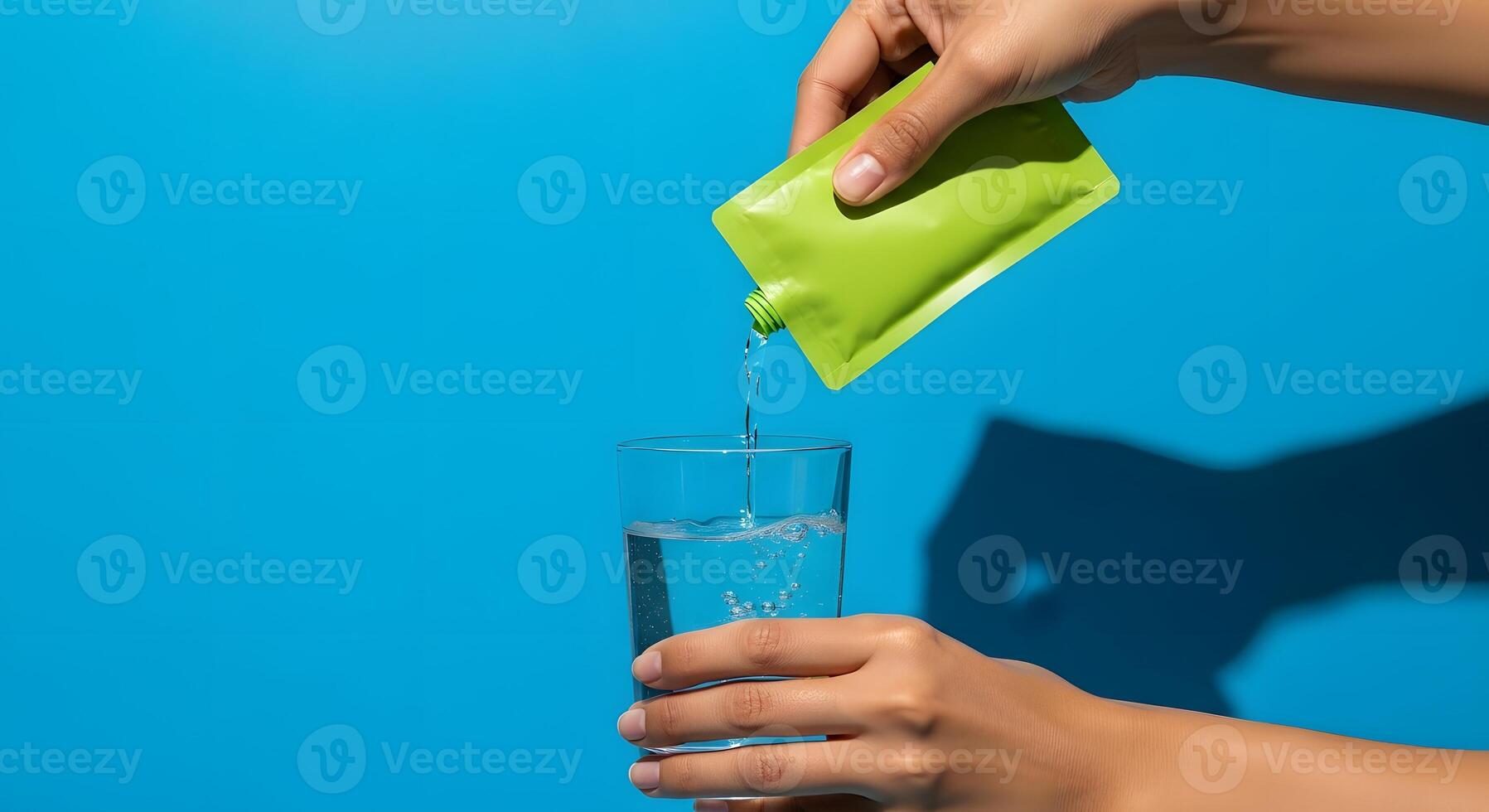 Hydration on Bright Blue A Wellness Ritual Unveiled, Pouring Hydration A Fresh Take on Wellness and Vitality photo