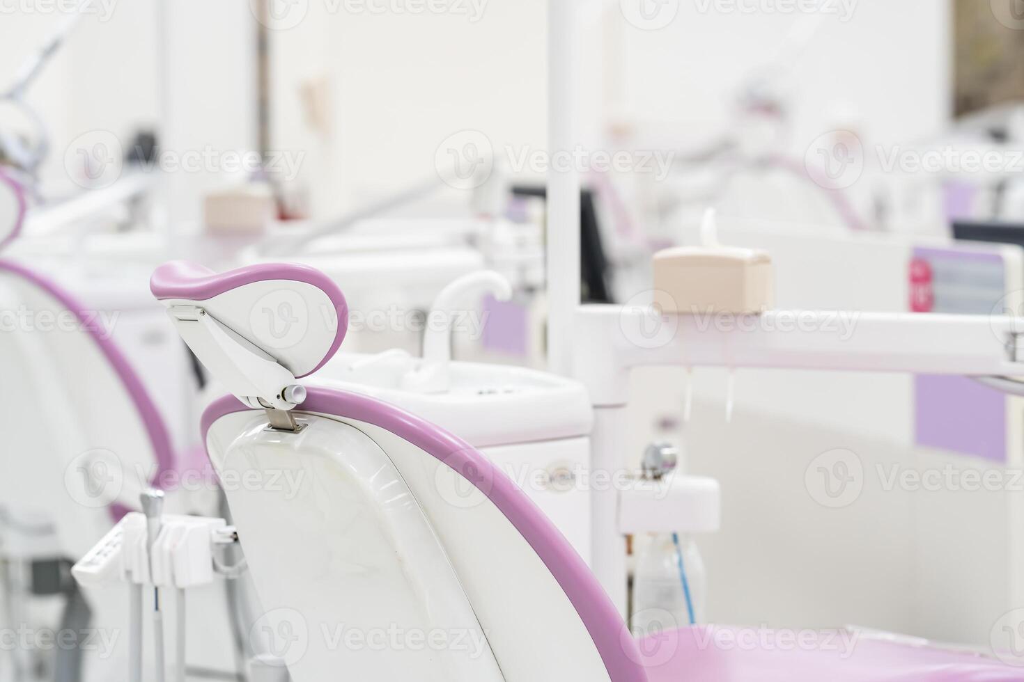 Many modern dental equipment and seats in a hygiene and sterile dental training room in the hospital.a photo