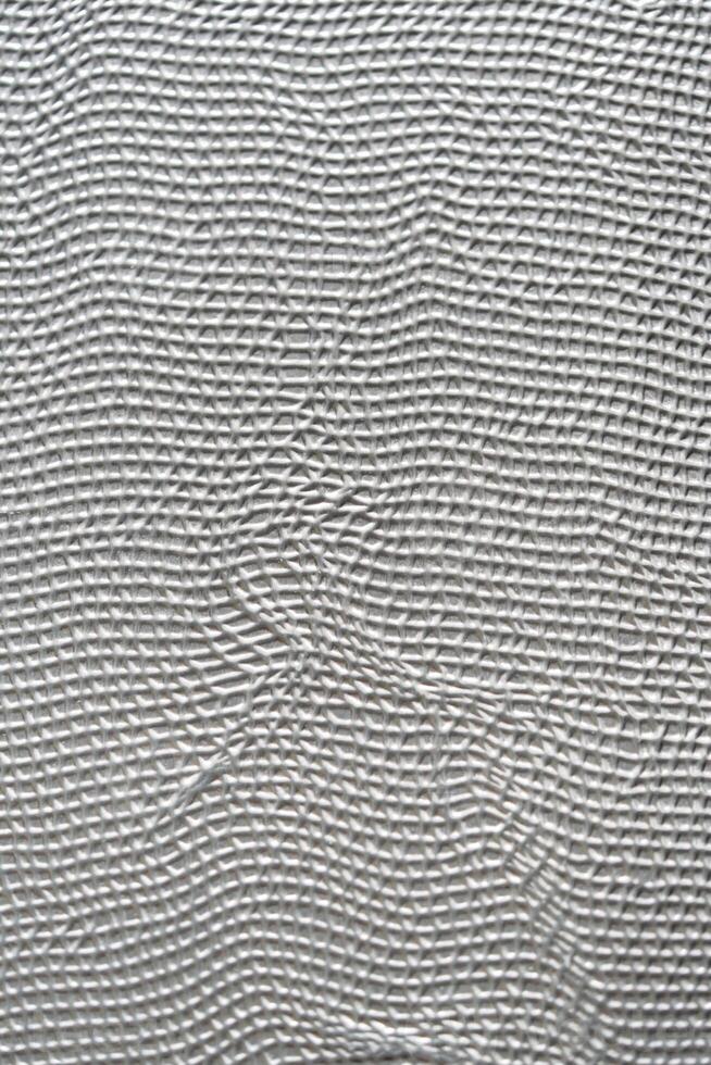 The aluminum silver stripe had a seamless background of a random line pattern, giving it a dynamic and eye-catching appearance. The silver color added to the sleek and modern look.a photo