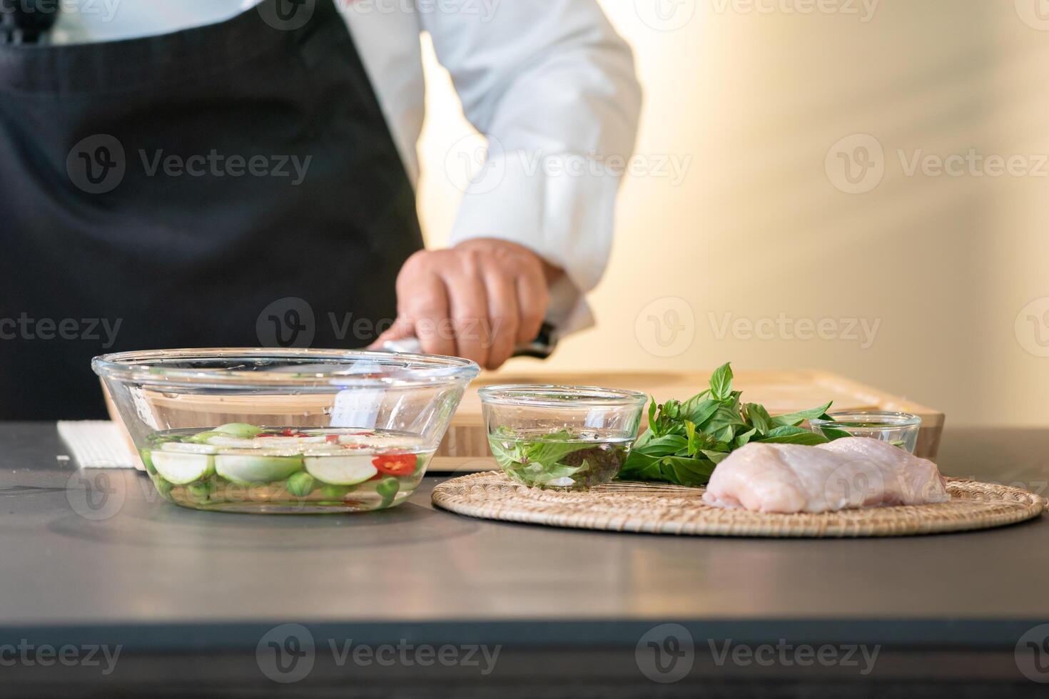 Sterillizer for washing vagetable by chef, food and herbal ingredients were saoked in hygined water to prepare to cook.a photo