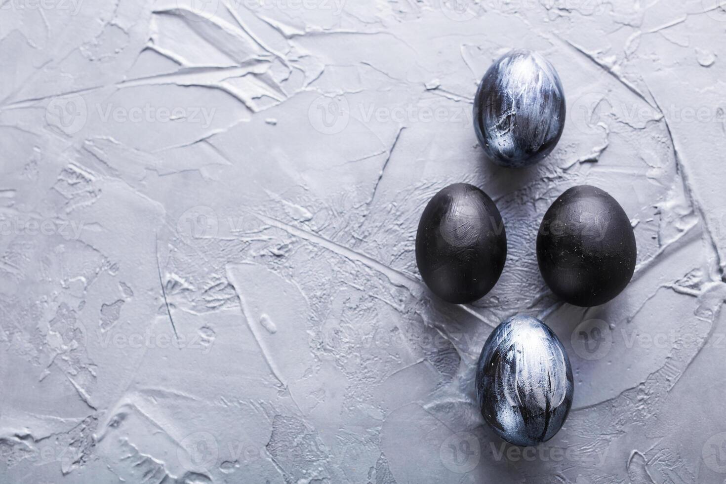 Holidays, design and modern easter - Black and brown easter eggs style minimalism on white background with copyspace. photo