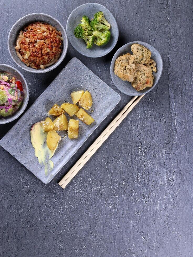 Asian-inspired dish with vegetables and rice photo