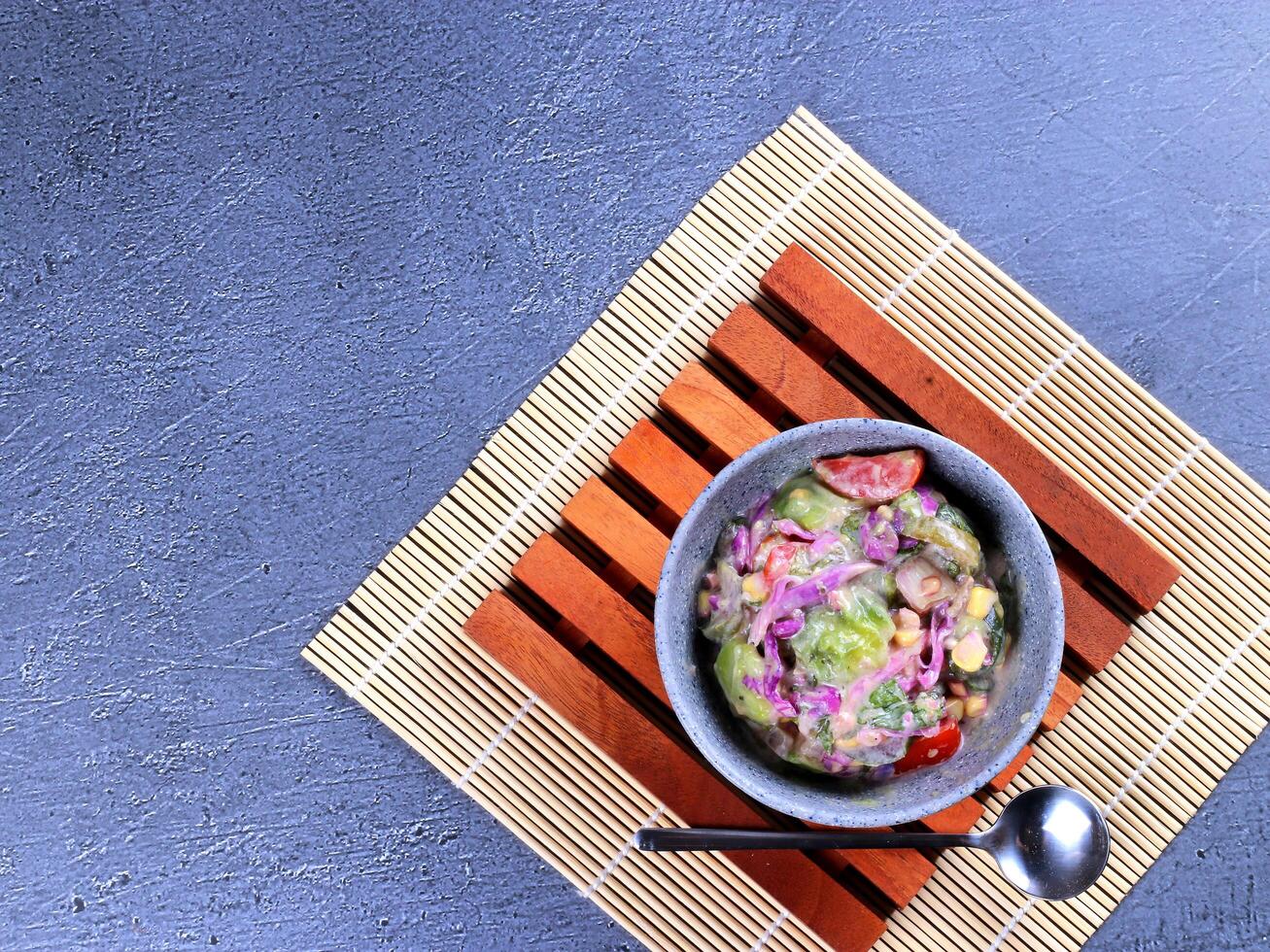 Bowl of fresh vegetable salad photo