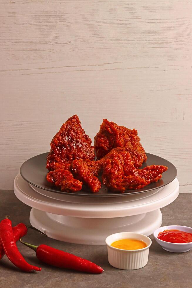 Spicy fried chicken and dipping sauces photo