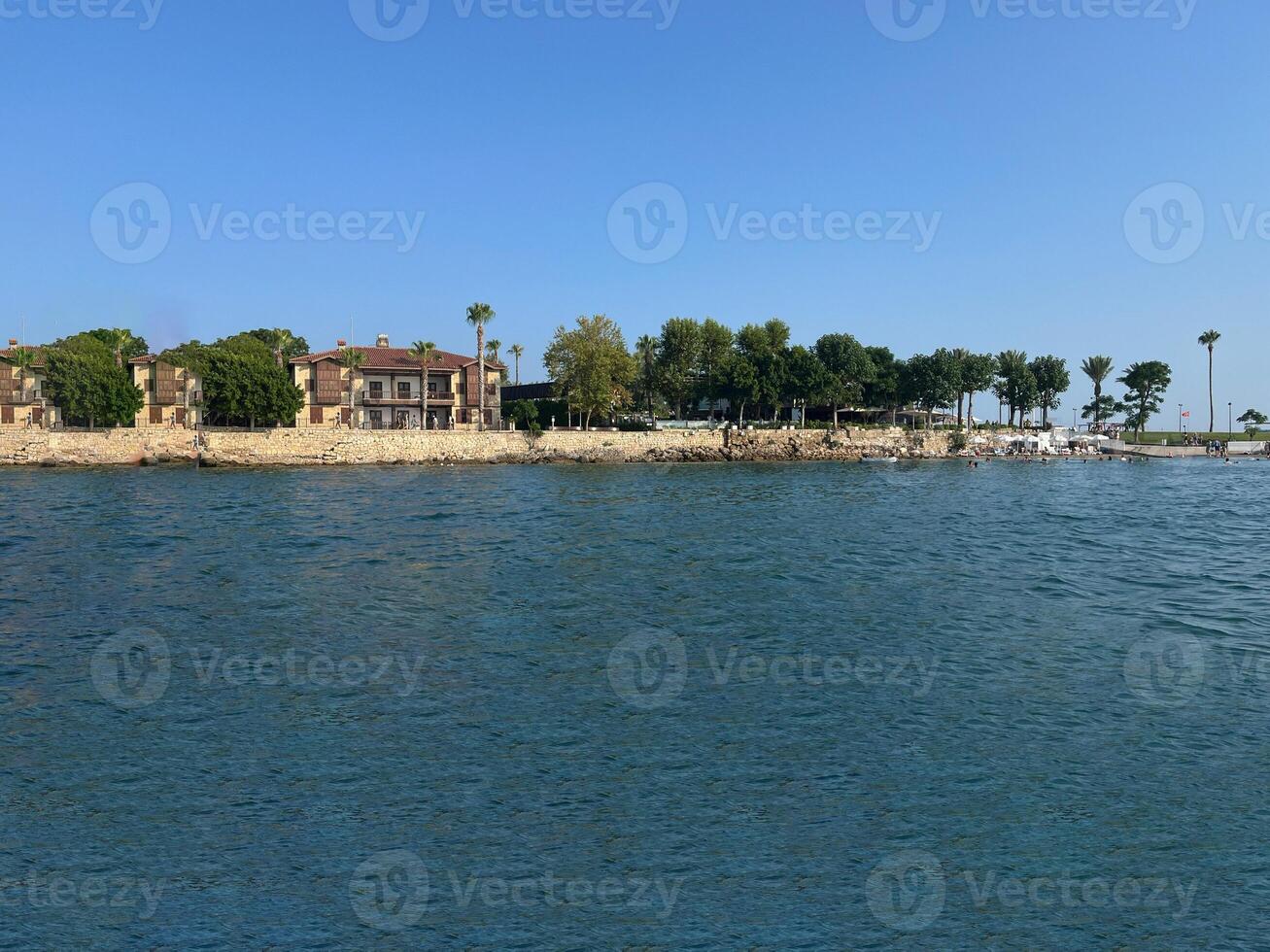 sea, water, city, sky, panorama, travel, europe, coast, boat, view, landscape, summer, town, mediterranean, building, tourism, architecture, river, beach, port, island, coastline photo