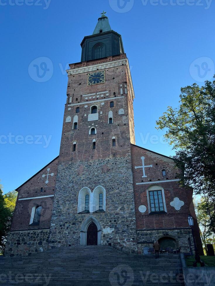 church, tower, architecture, building, religion, cathedral, old, europe, sky, landmark, travel, city, historic, town, stone, catholic, gothic, medieval, ancient, religious, tourism photo
