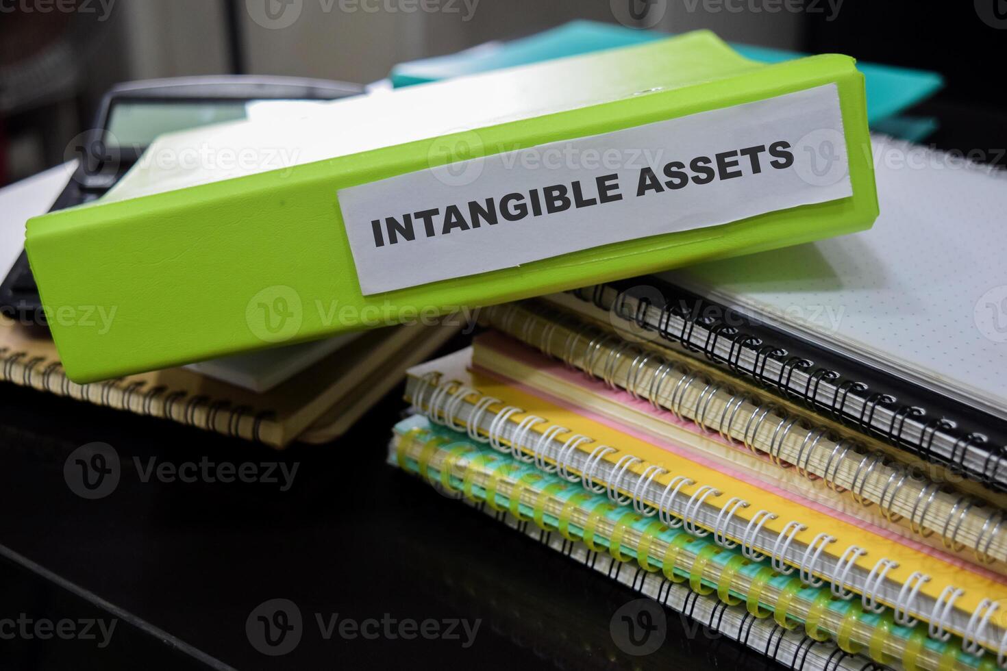 Folders with the label Intangible assets. Business management concept photo
