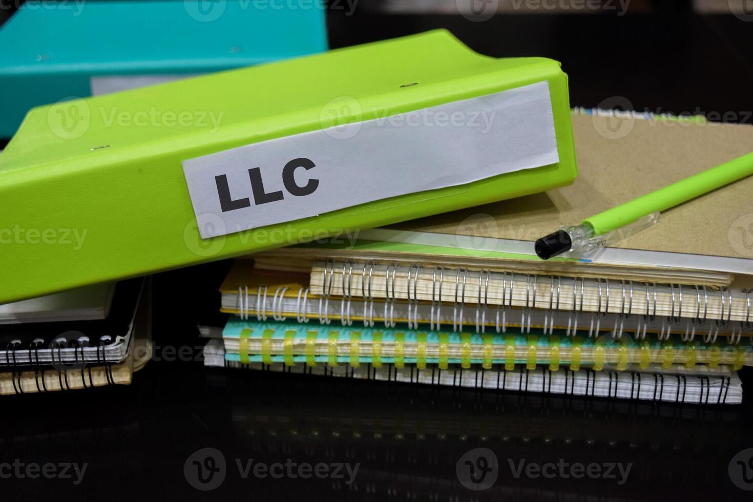 Folders with the label LLC. Business management concept photo