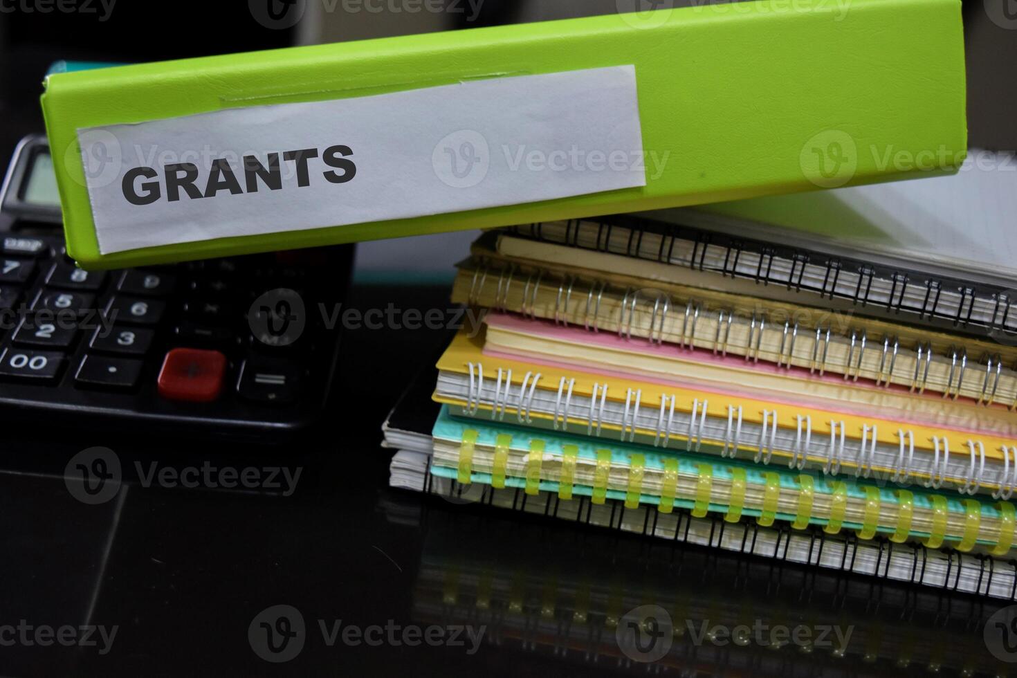 Folders with the label grants. Business management concept photo