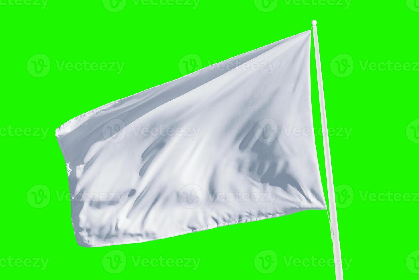 White flag waving isolated in chroma key green. Perfect for themes of surrender, calm communication, or neutral design in web or print projects photo