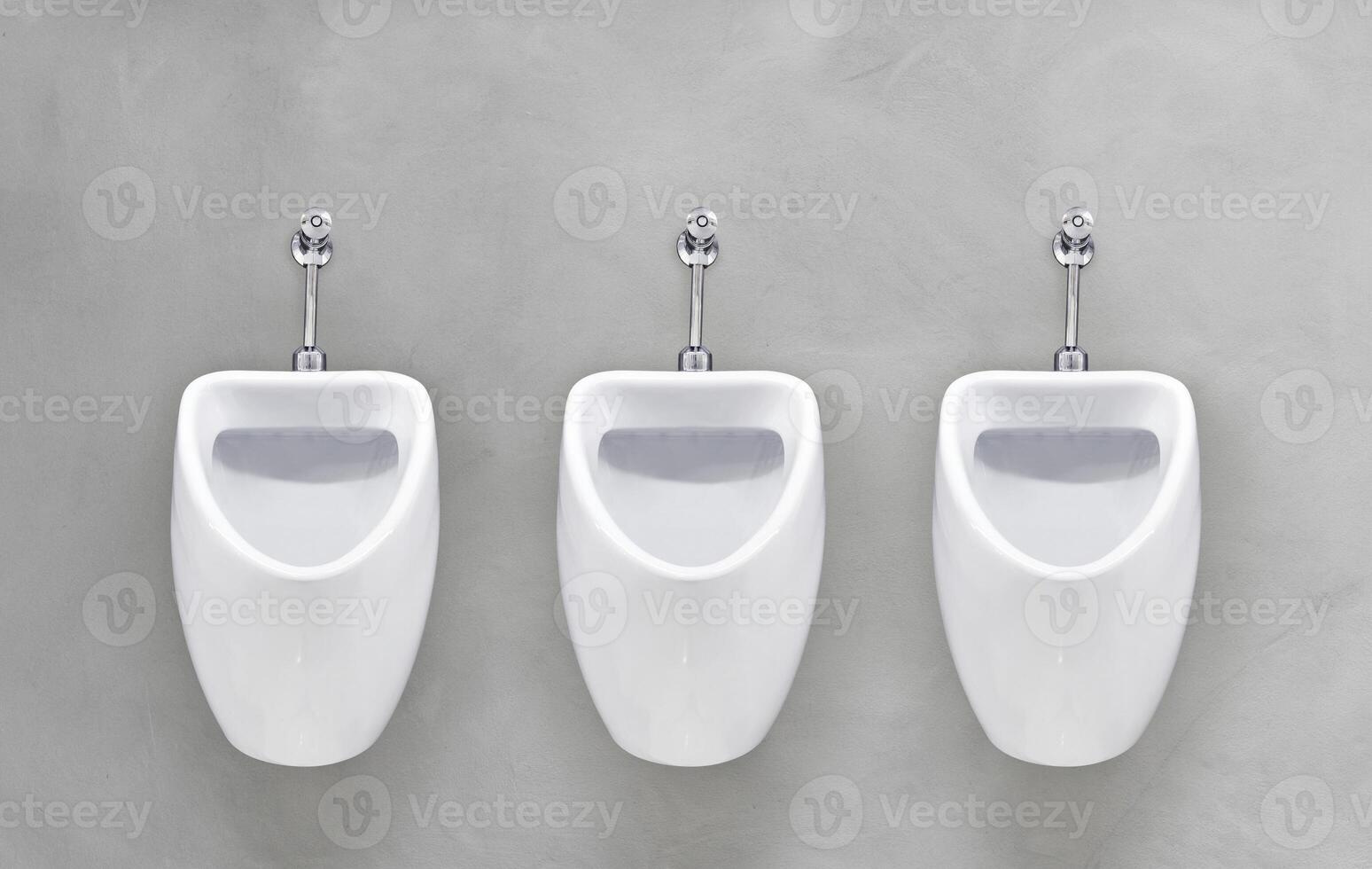 Men's toilet. Row of outdoor urinals men public toilet, Closeup white urinals in men's bathroom. photo