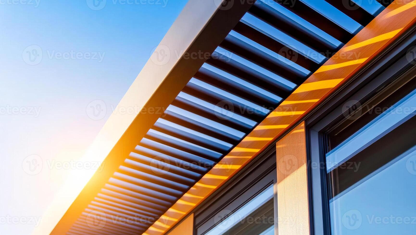 Modern sunlit architecture. Sunlight casts patterns on a sleek modern roof design, highlighting the innovative structure and materials used. photo