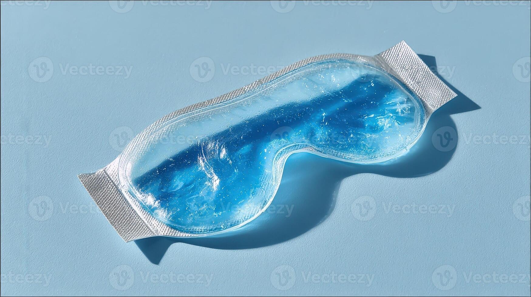 Cooling under eye mask in transparent packaging designed for reducing puffiness and rejuvenating tired eyes photo