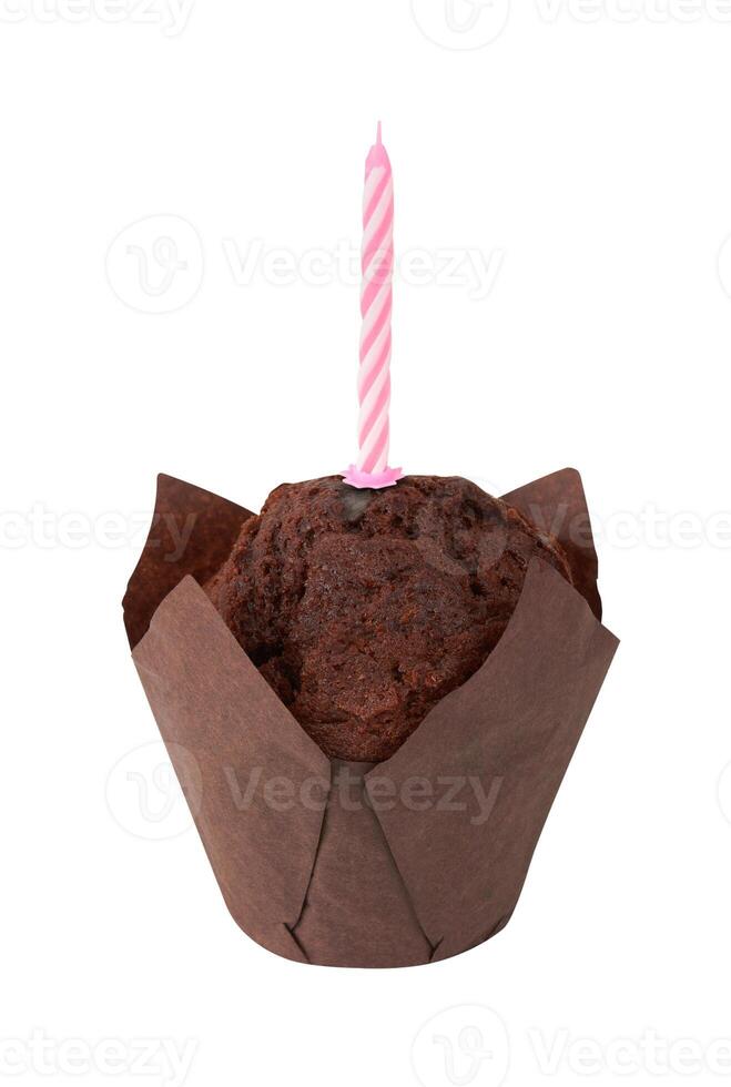 Cupcake with candle on a white photo