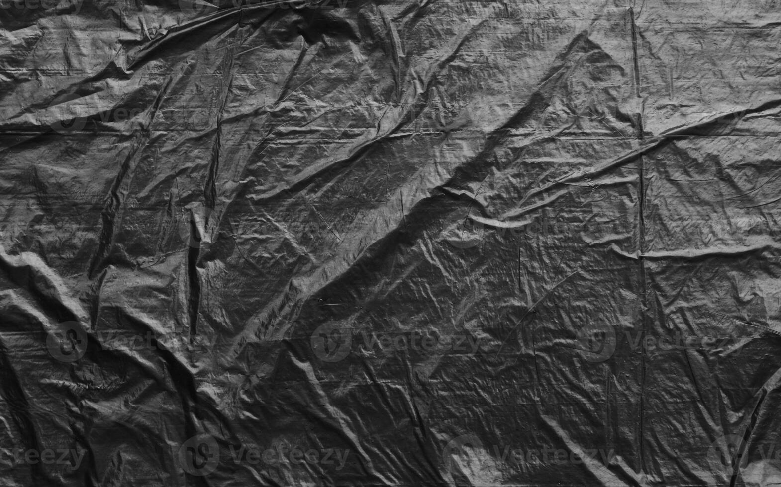 Black plastic wrap texture background photo