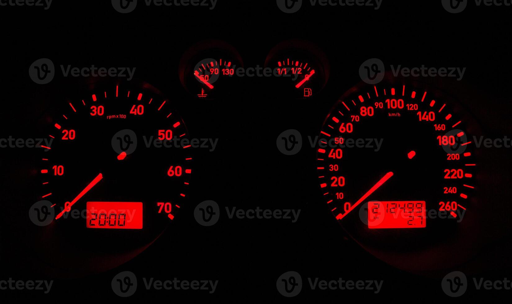 Car dashboard glowing a red light photo