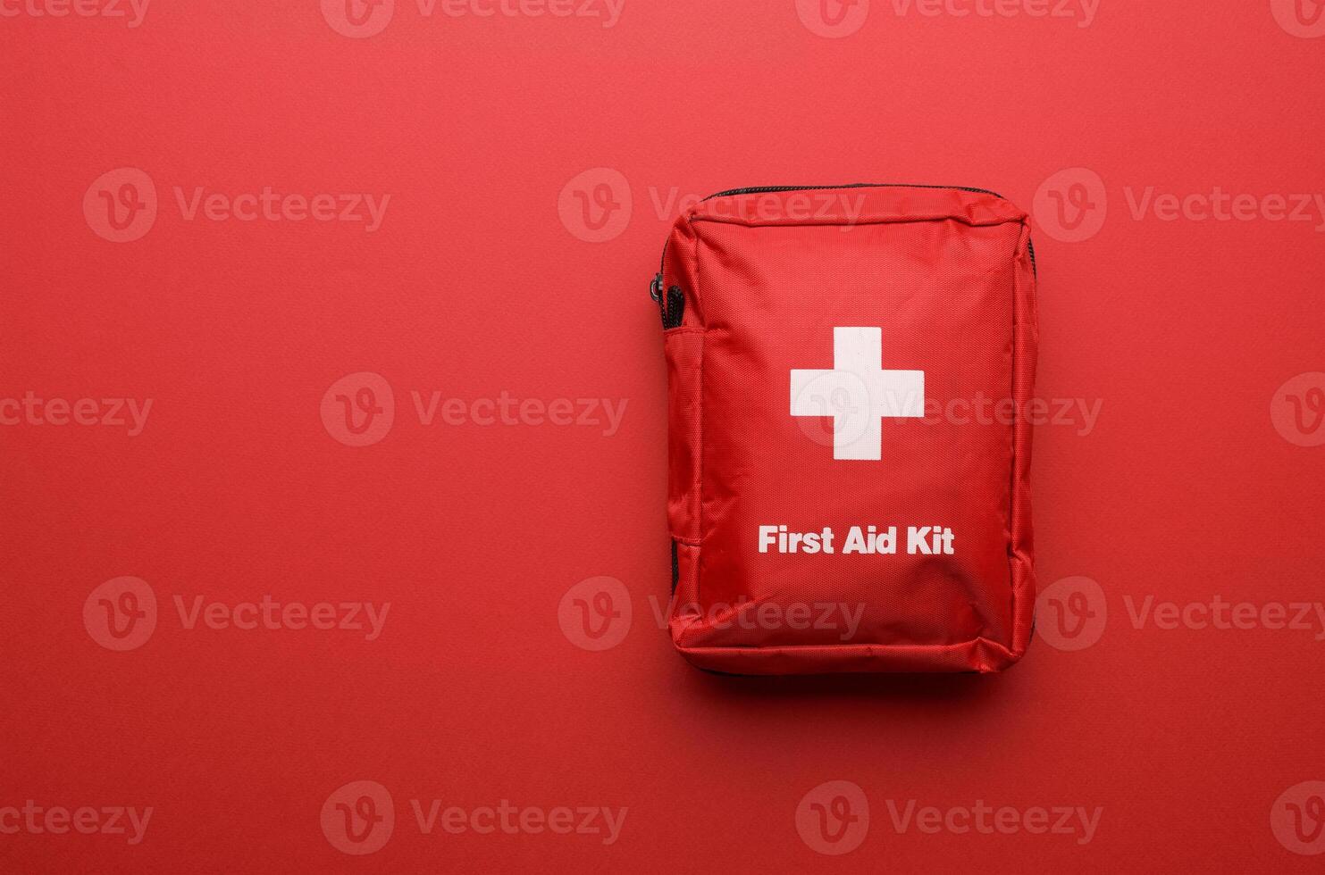 First Aid Kit on a red back photo