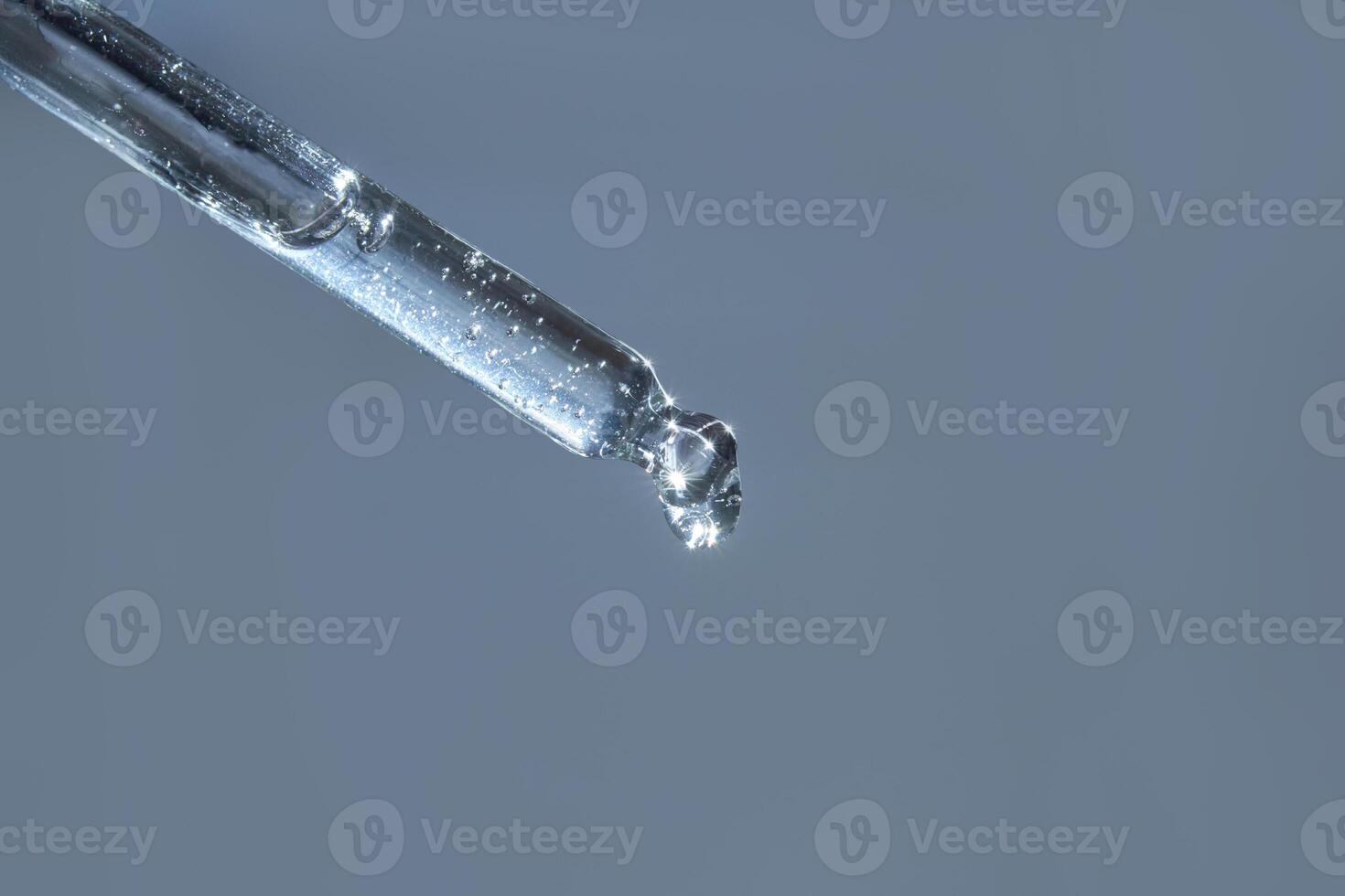 Droplet on a laboratory pipette photo
