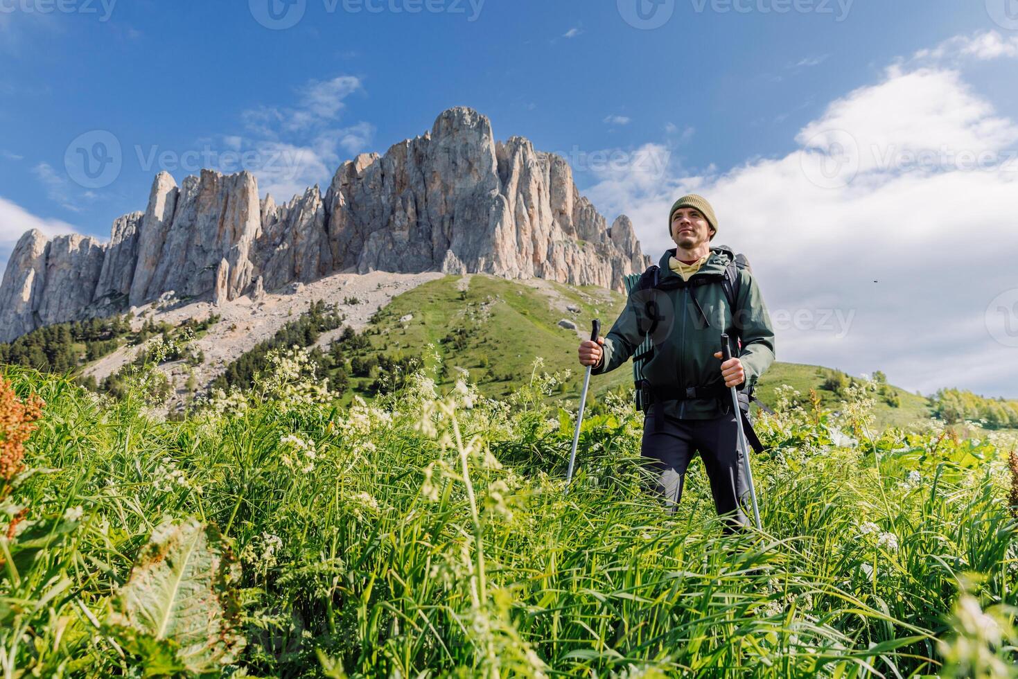 Hiker enjoying mountain scenery photo