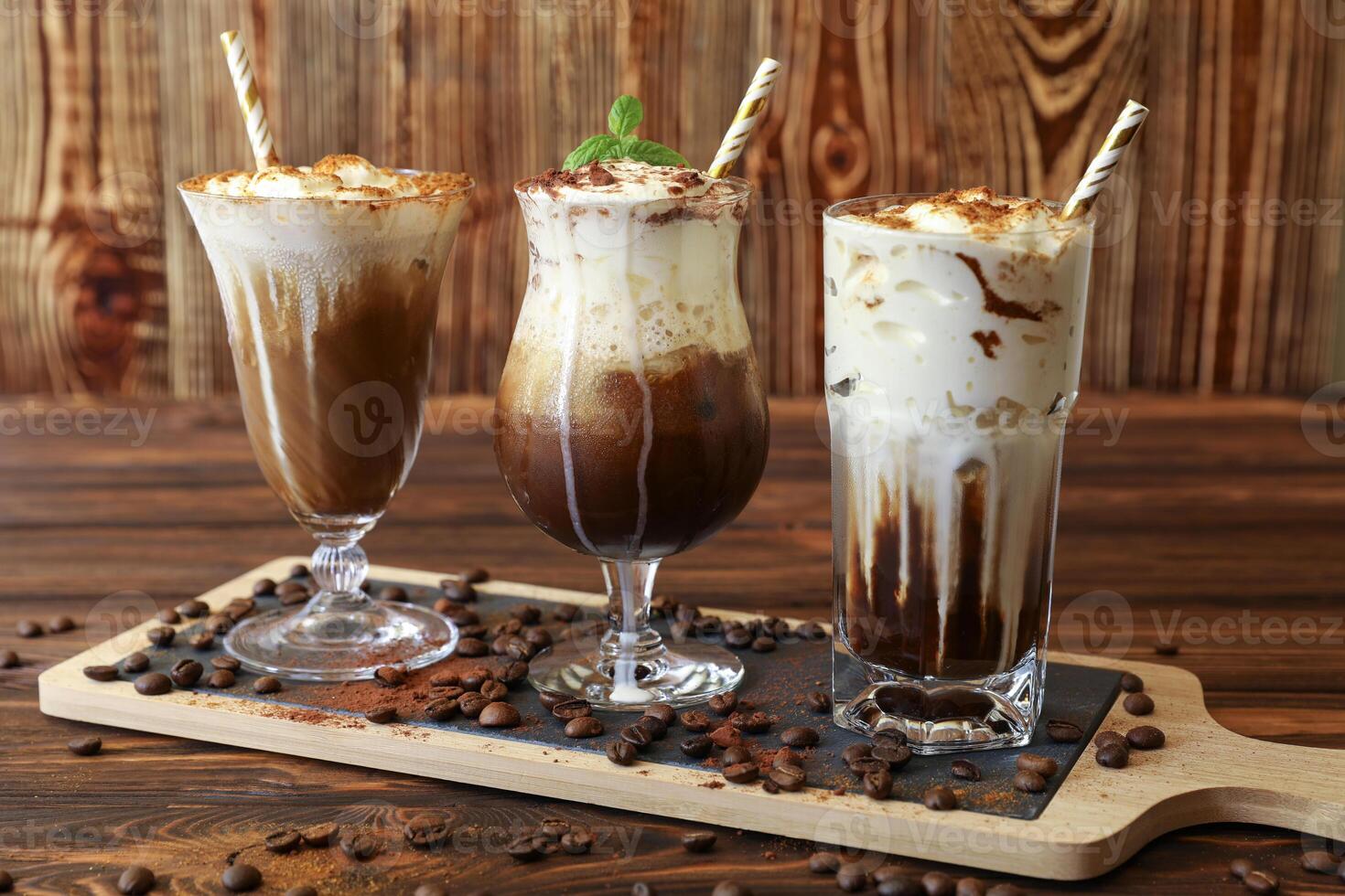 Latte coffee beverages are displayed on wooden board, showcasing rich colors and creamy textures. Each drink features unique toppings and presentation. photo