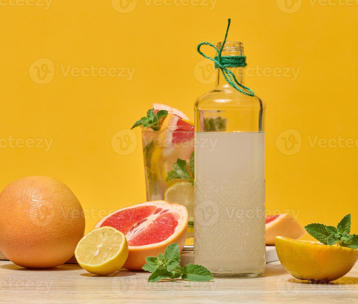 Citrus drink with mint and fruits photo