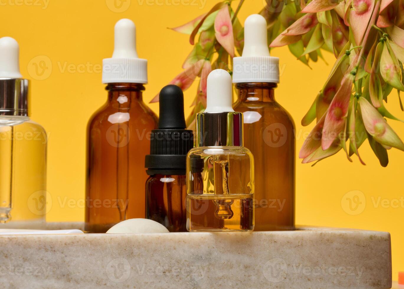 Bottles of essential skincare oils photo