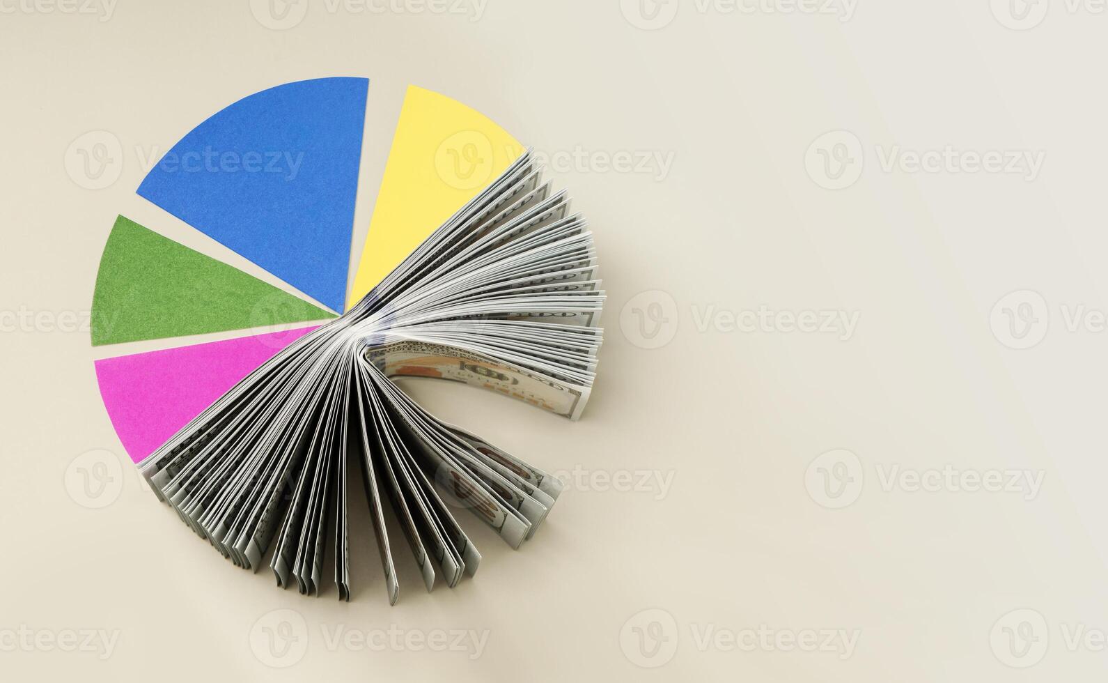 US dollar Pie Chart representing Smart portfolio allocation between cash and assets, diversified financial strategy. table top view photo