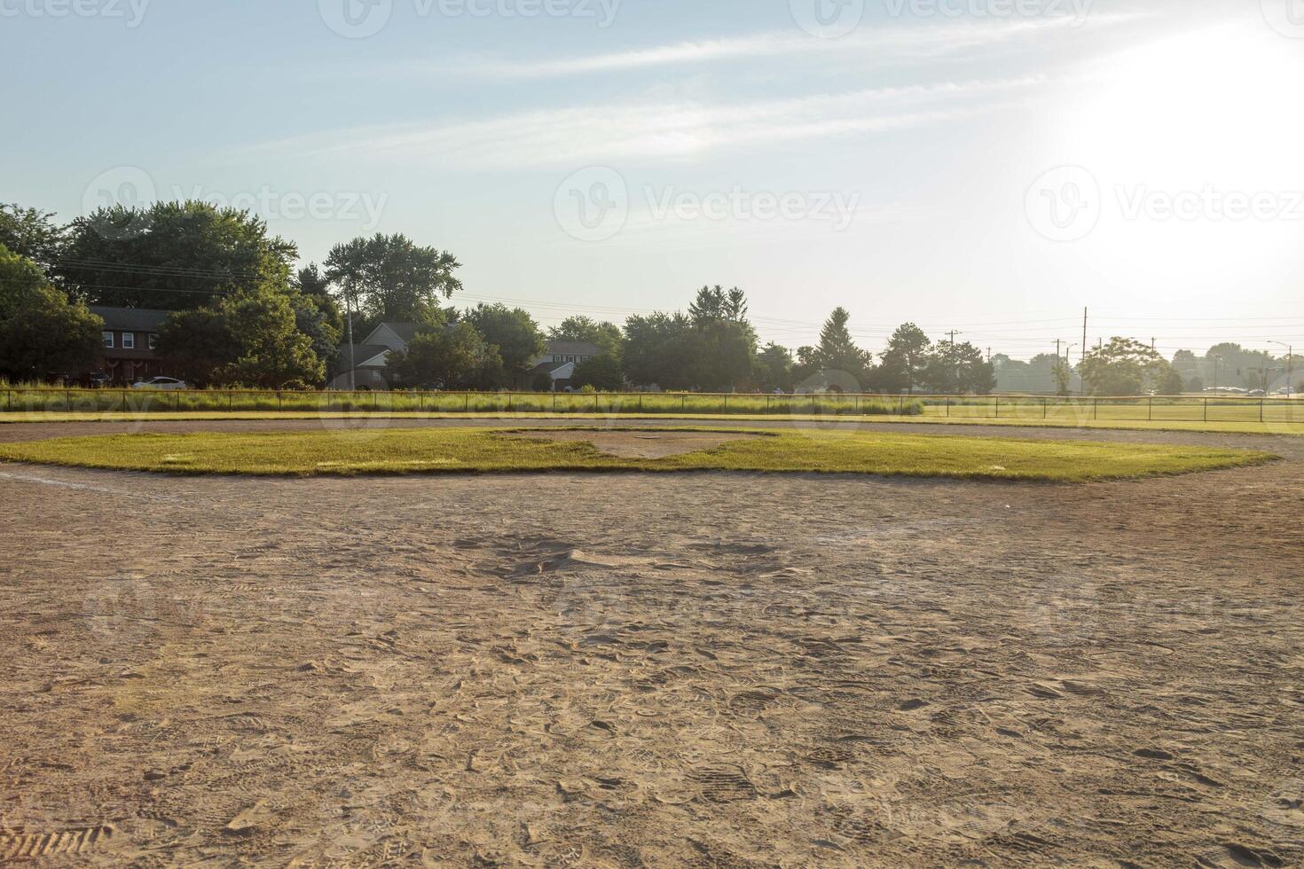a view of the infield and outfield of diamond two at dawn photo