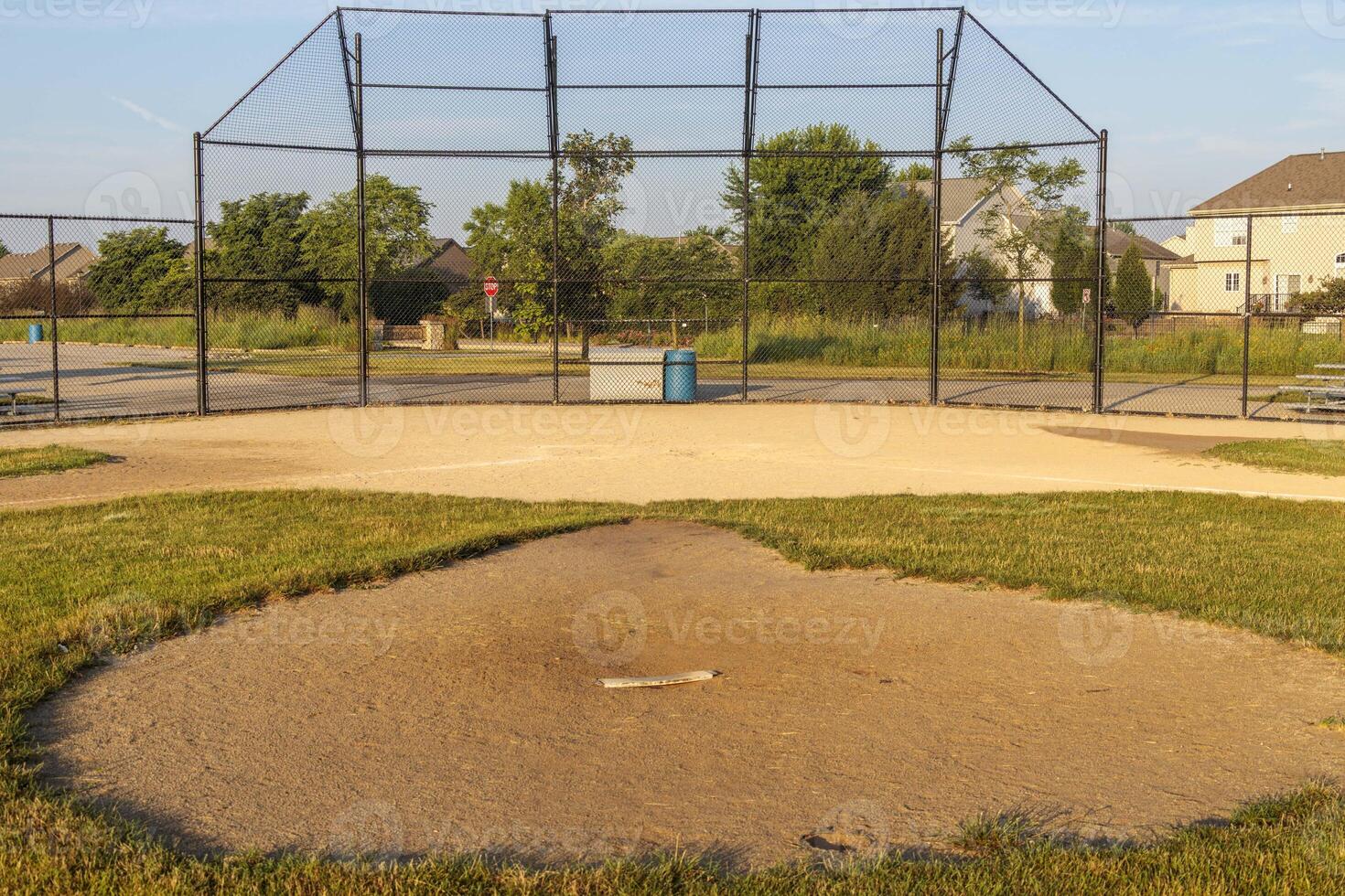 a view of the backstop and homeplate from the pitchers mound on diamons two photo