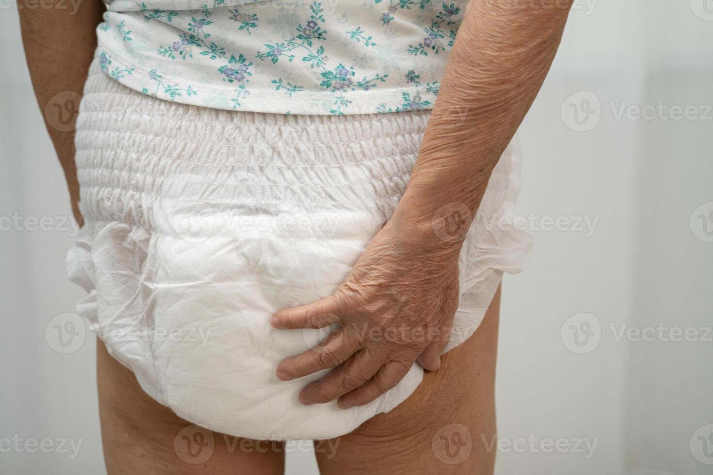 senior wearing adult incontinence diaper photo