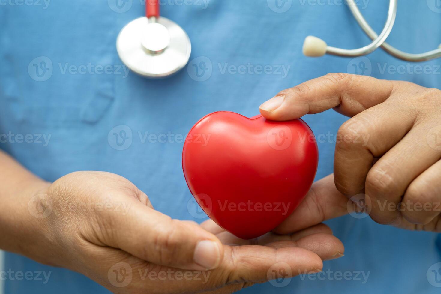 woman doctor with red heart photo