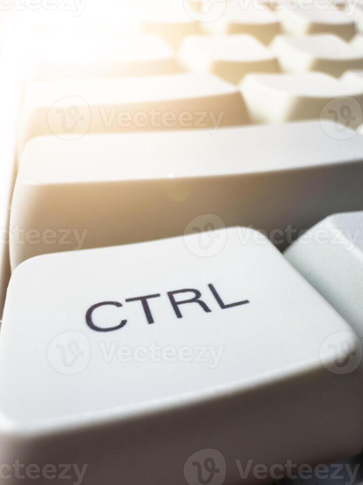 White CTRL button on mechanical white keyboard, business concept, for advertising photo
