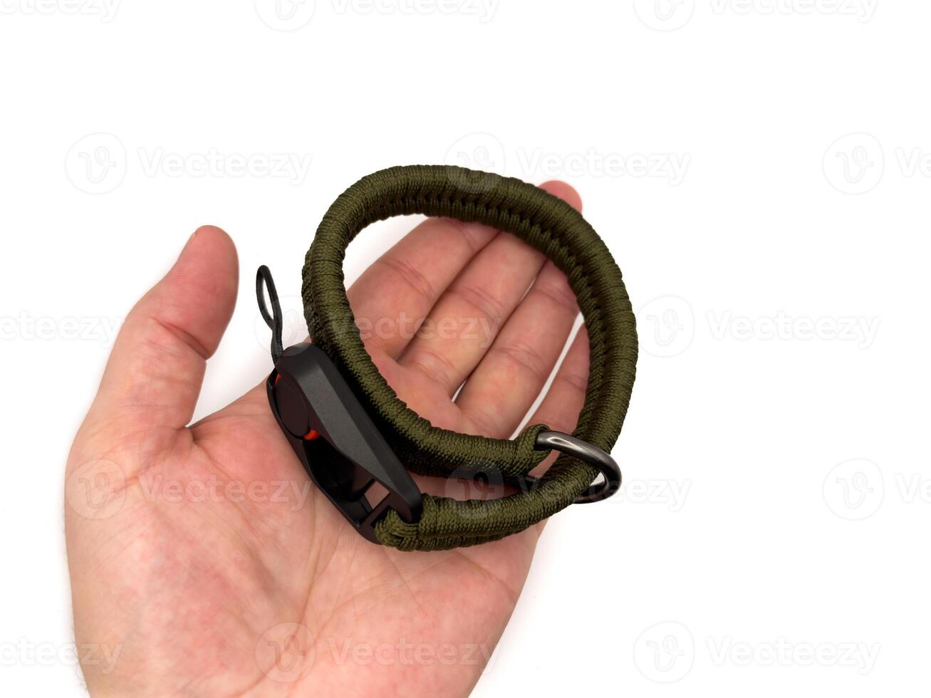 Green camera strap in the form of a rope on a white background. copy space, top view photo
