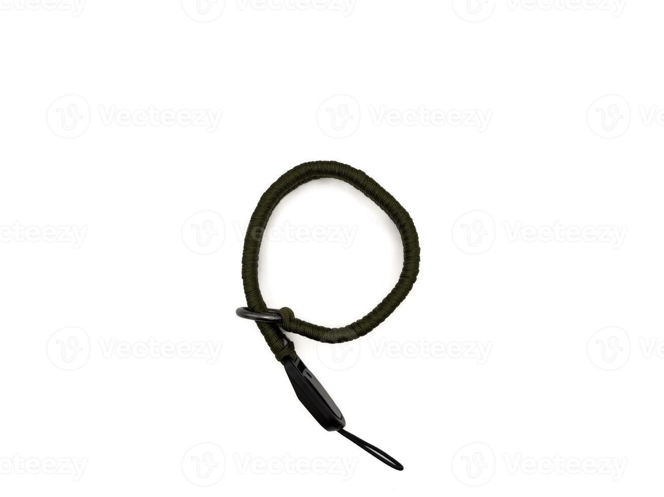 Green camera strap in the form of a rope on a white background. copy space, flay lay photo