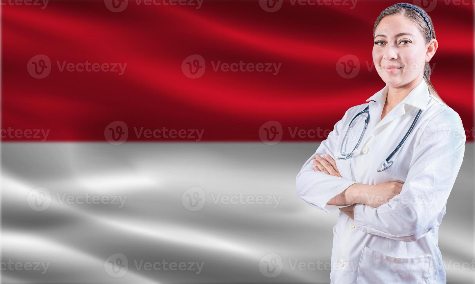 Female doctor on Monaco flag. Doctor with crossed arms on Monaco flag. Monaco health and care concept photo