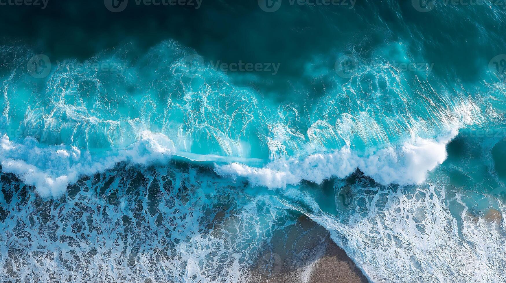 Aerial View of Dynamic Ocean Waves with Turquoise and White Foam Creating Abstract Patterns1 photo