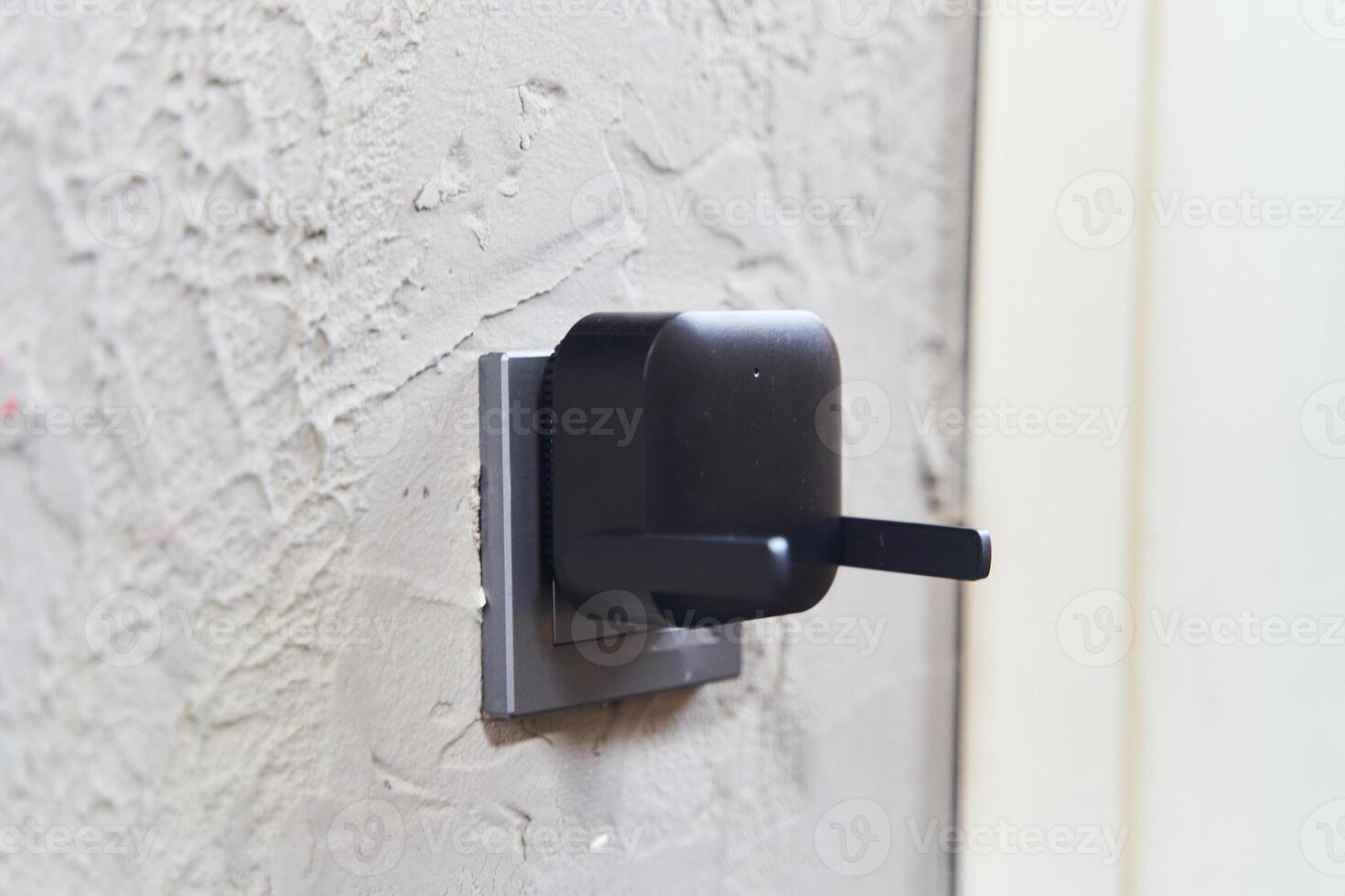 Black wifi signal booster on white background. Wifi connection. Wifi transmitter, router. photo