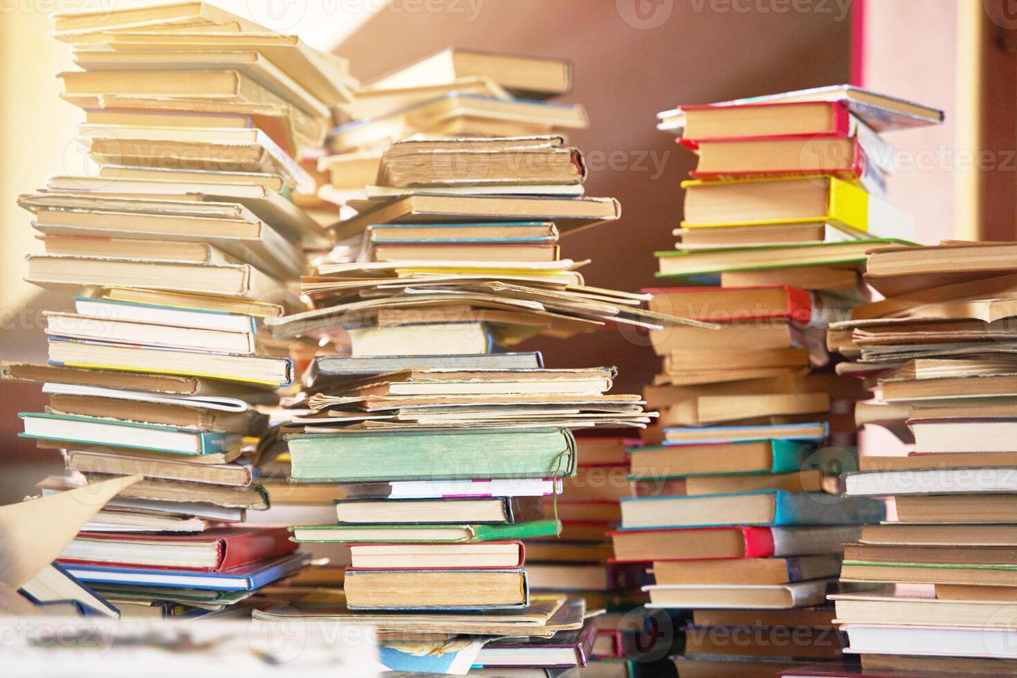 pile of old books on the table photo