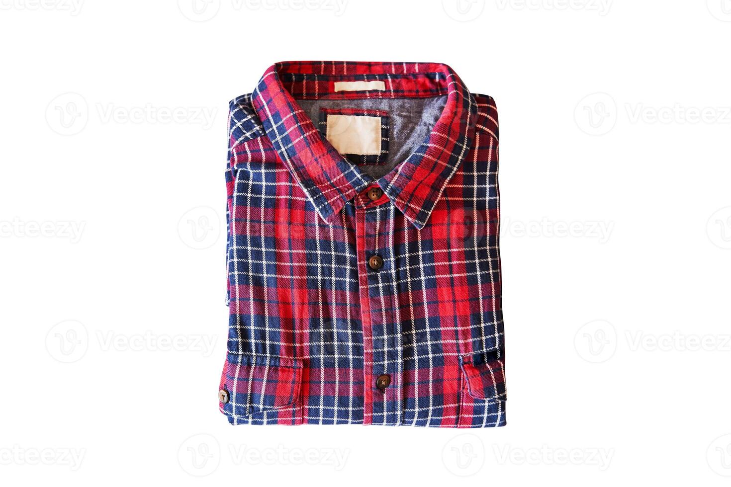 Red checkered flannel shirt folded on a white isolated background photo