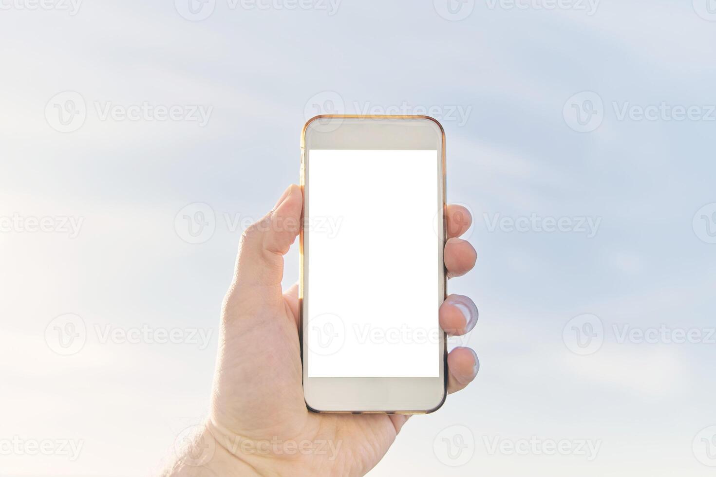 A Man hands holding smart phone with blank copy space screen photo