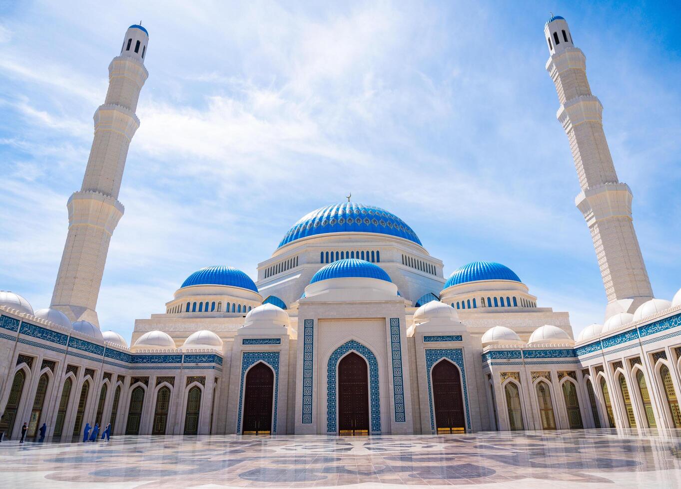 Astana, Kazakhstan - May 21,2025. Central mosque of Astana captured from inner courtyard. Architectural harmony and spiritual atmosphere in the heart of Kazakhstan capital. photo