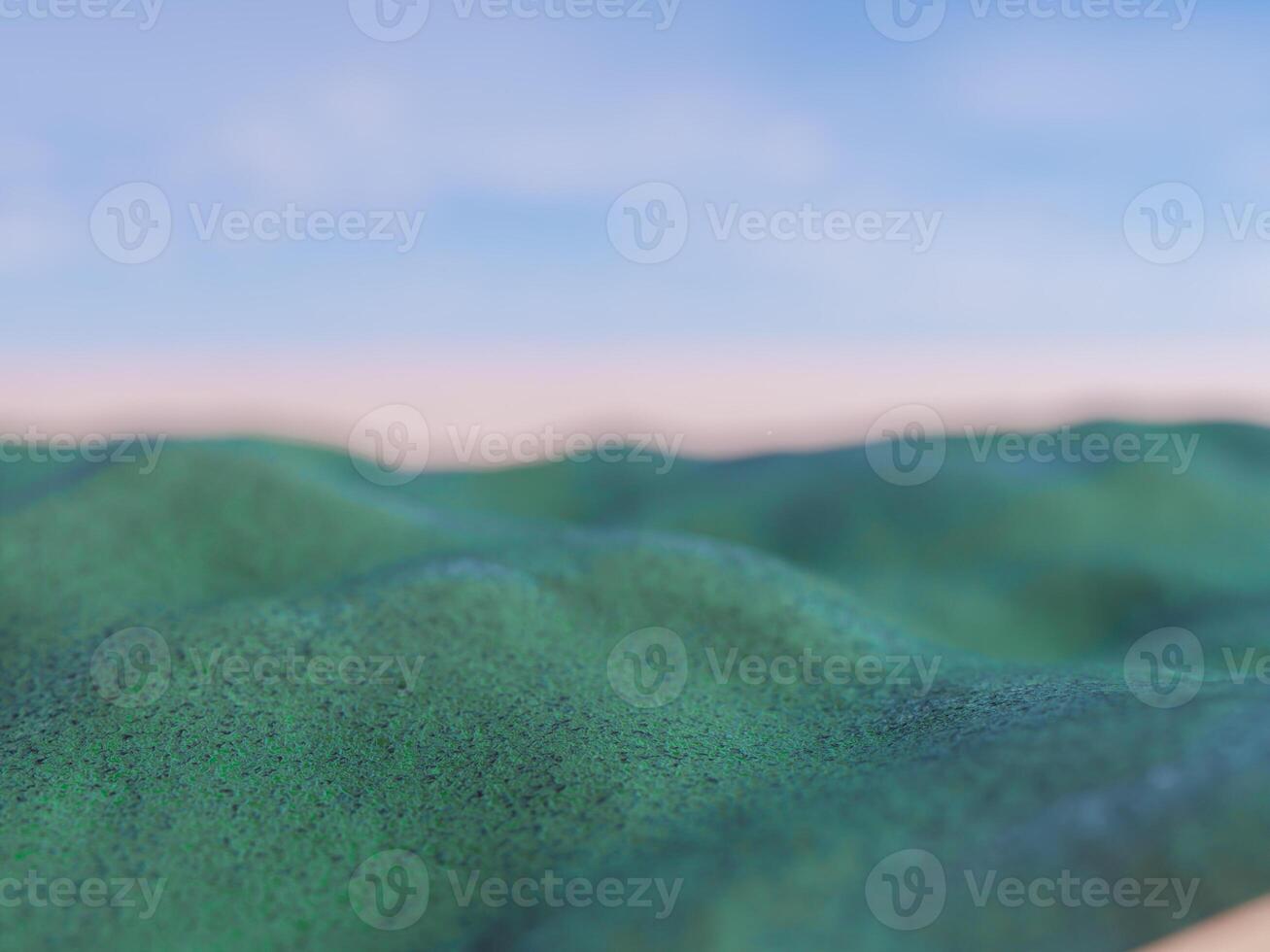 Soft sand dunes on the beach with a blurred ocean background during sunset. photo