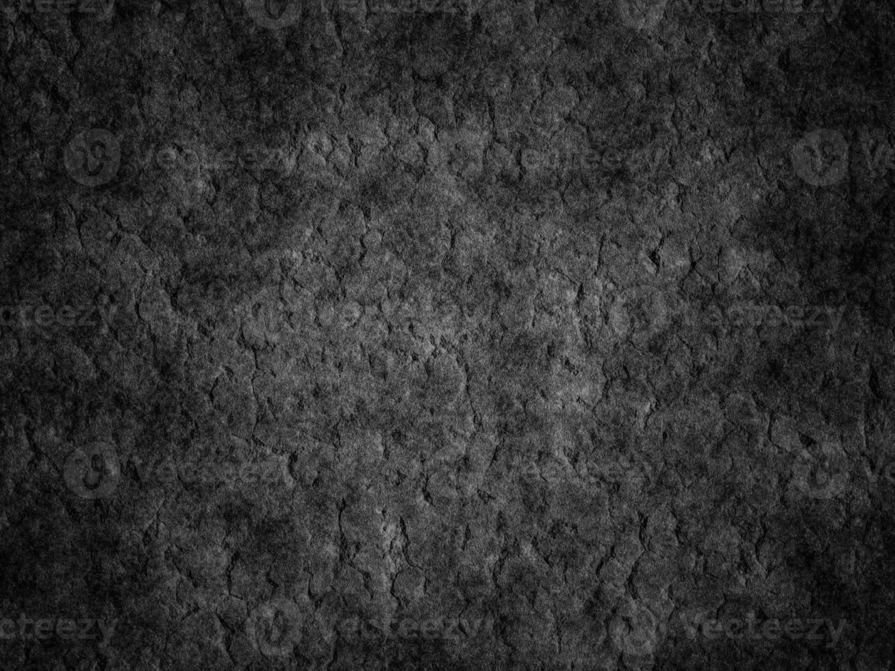 Close-up of rough cement texture with irregularities and aged patterns. photo