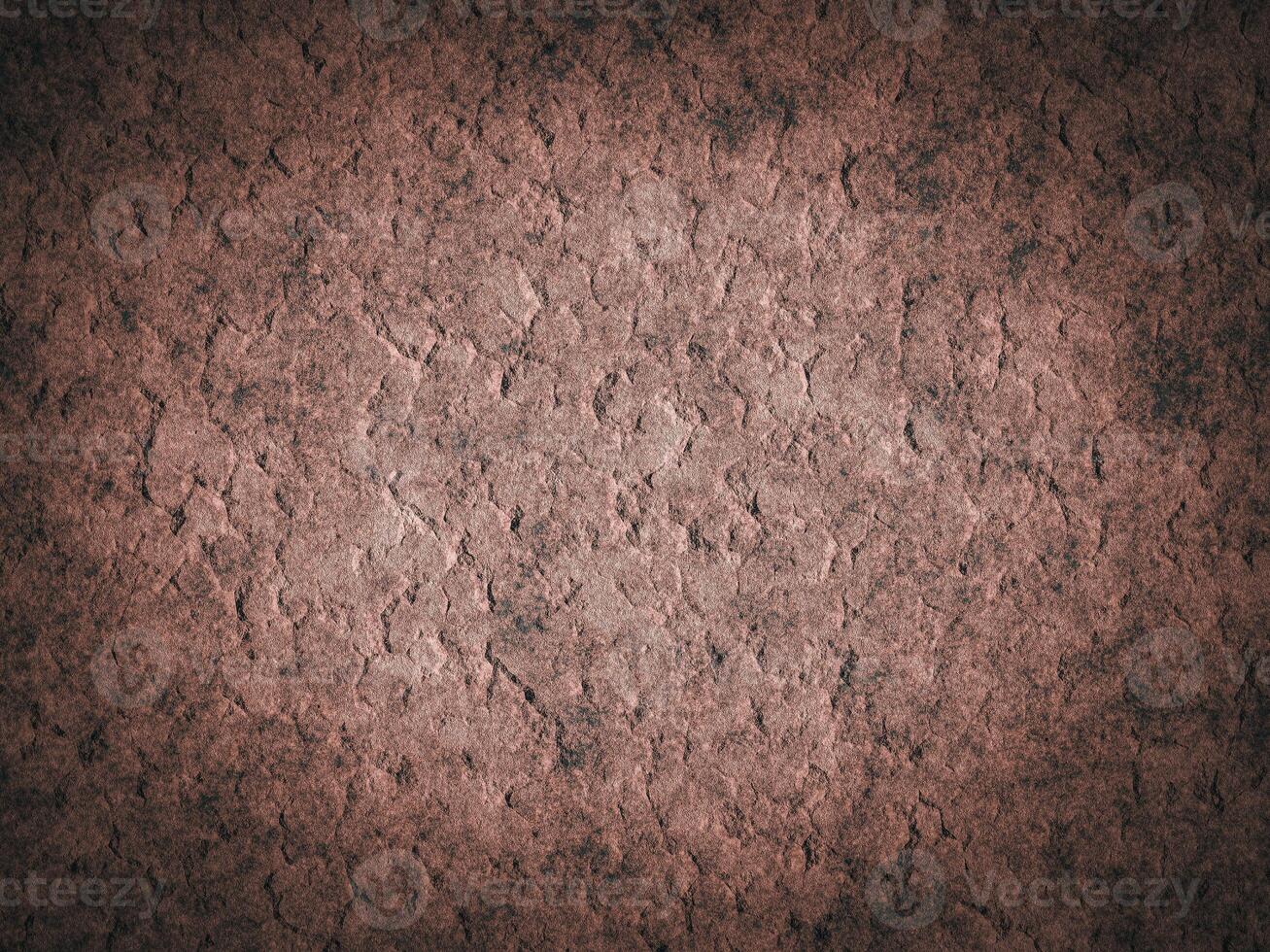 Weathered rough cement texture with uneven surface patterns and cracks. photo