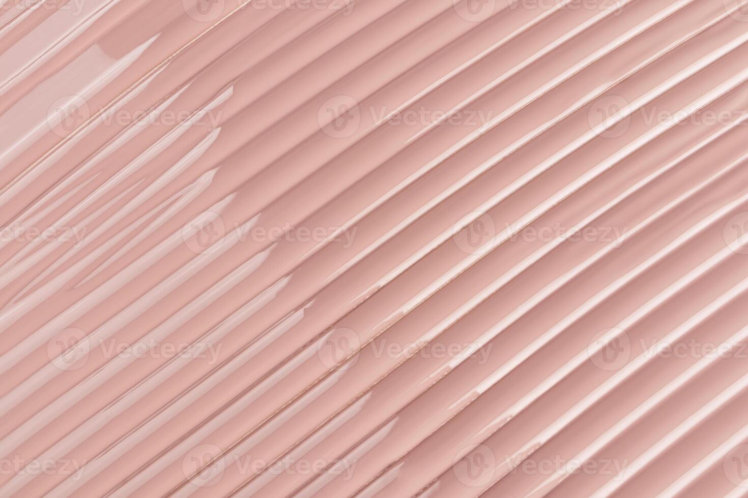 Chic cosmetic background texture of liquid foundation powder in natural tone. delicate parallel stripes. natural highlights of the texture. Layout. photo