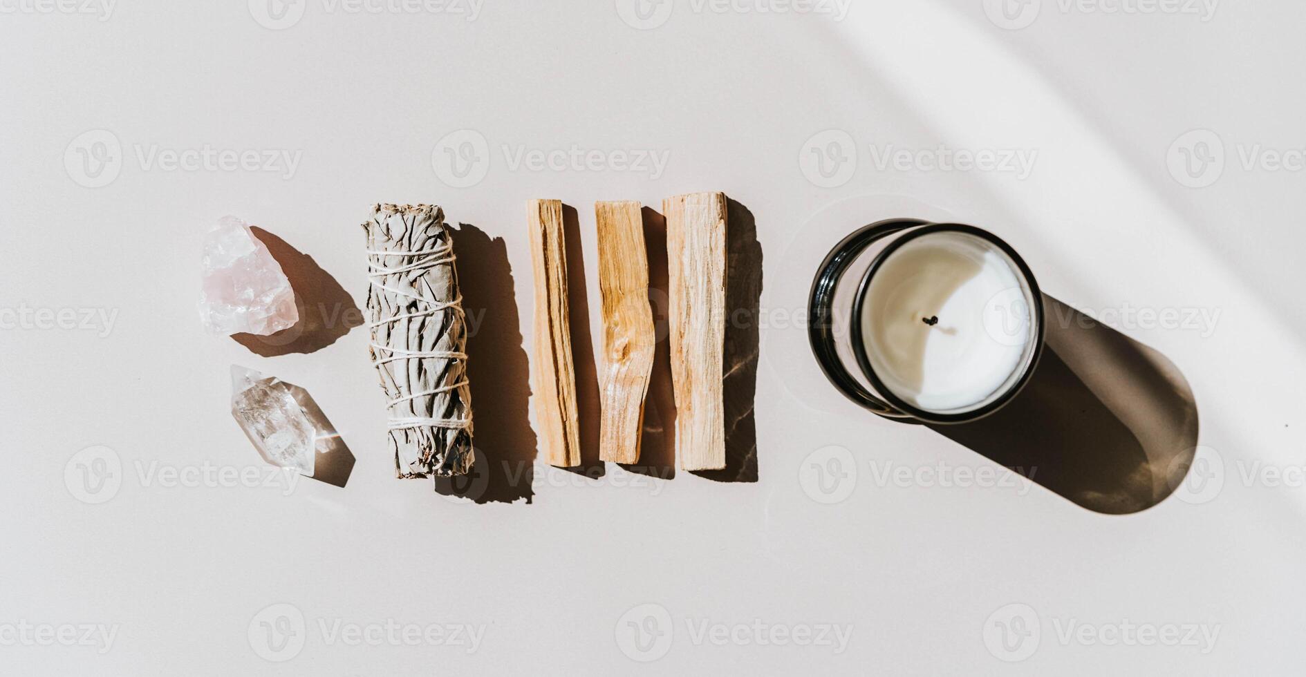 White sage, Palo Santo, amethyst and quartz crystals photo